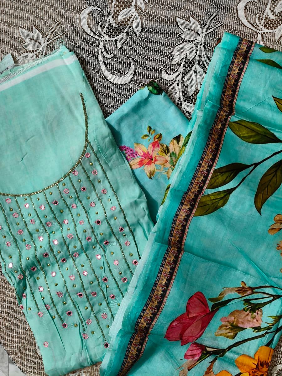 হাফ-সিল্ক কামিজে কারচুপির কাজ। Karchupi work on Half-silk kameez.